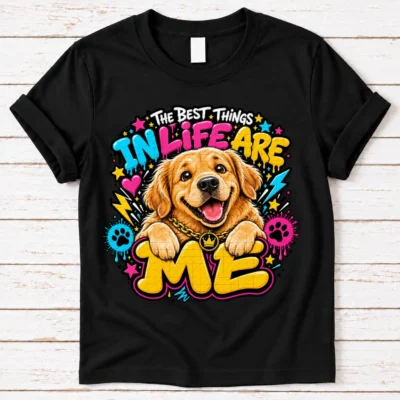 Golden Retriever pride shirt artwork with a smiling golden dog, tongue out, crown medallion, bold neon lettering, hearts, paw prints, and lightning bolts.