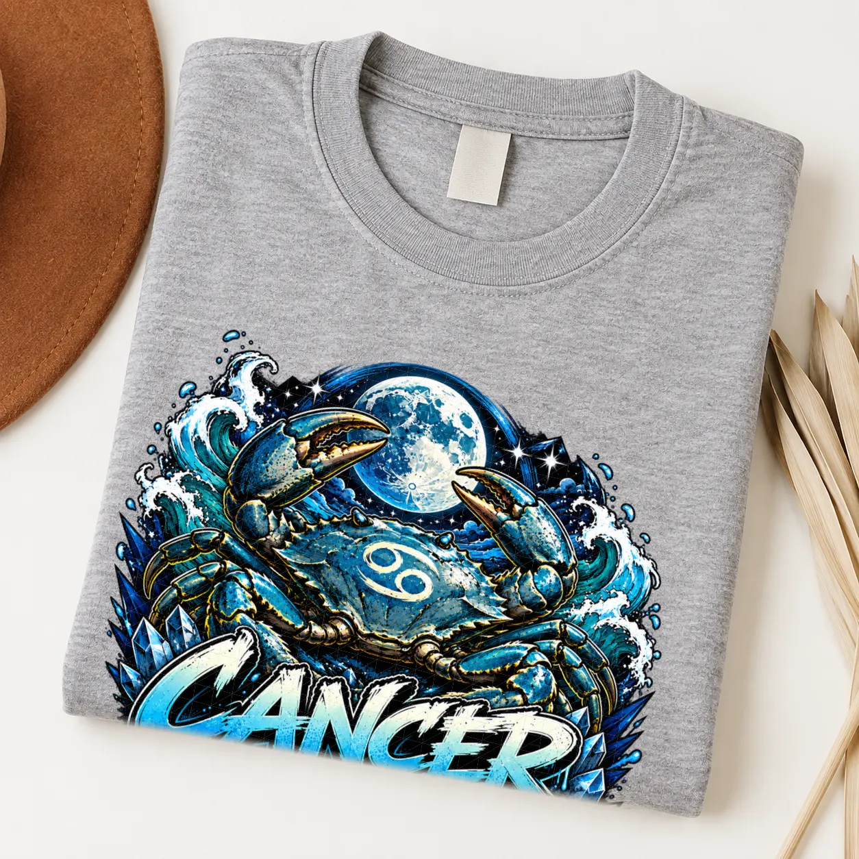 Cancer Protective Soul Zodiac Shirt design with large crab, full moon, crashing blue waves, Cancer glyphs, and blue graffiti text